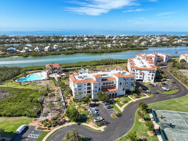 bird's eye view with a water view