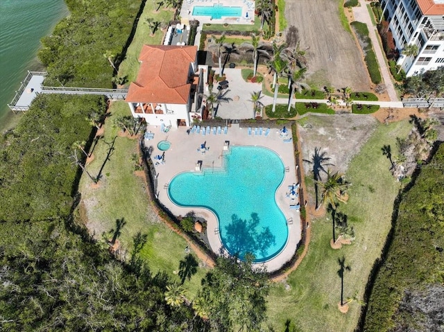 birds eye view of property featuring a water view