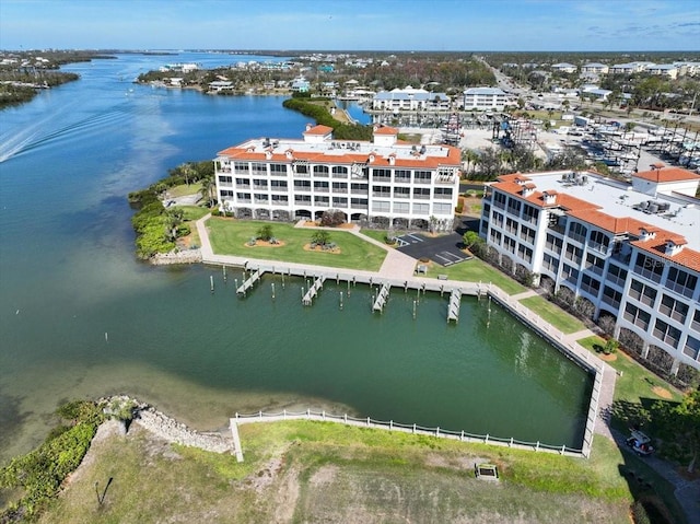 birds eye view of property featuring a water view