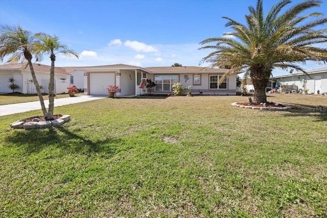 ranch-style house featuring a garage and a front lawn