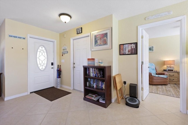 view of tiled entrance foyer