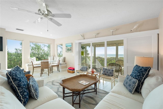 living room featuring ceiling fan