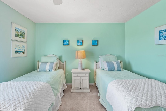 bedroom with light colored carpet and ceiling fan