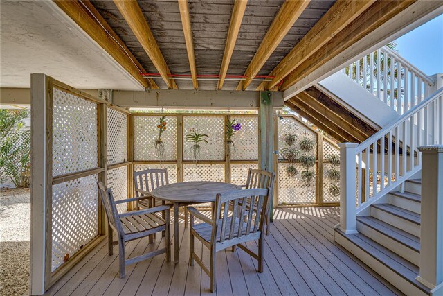 sunroom with lofted ceiling