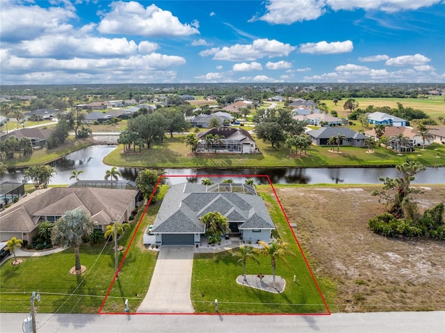 drone / aerial view featuring a water view