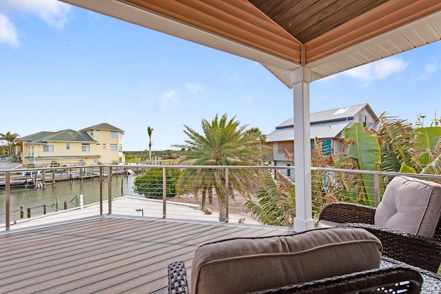 balcony featuring a water view