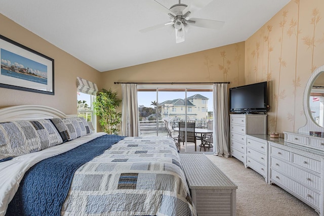 bedroom featuring vaulted ceiling, light carpet, access to exterior, and ceiling fan