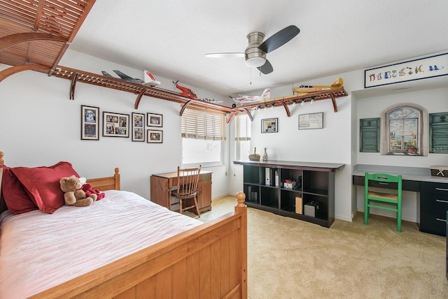 bedroom with light colored carpet and ceiling fan