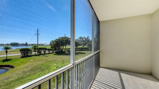 balcony featuring a water view