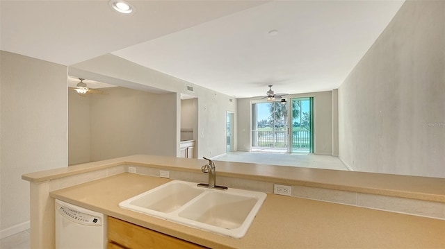 kitchen with sink, dishwasher, and ceiling fan