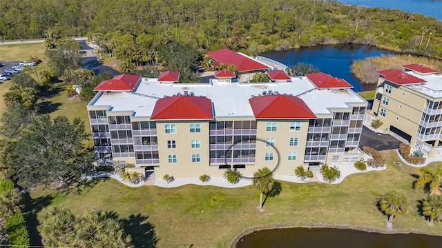 drone / aerial view with a water view