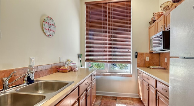 kitchen with fridge and sink