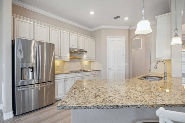 kitchen featuring sink, kitchen peninsula, white cabinets, and stainless steel refrigerator with ice dispenser