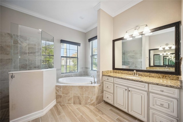 bathroom with crown molding, vanity, and plus walk in shower