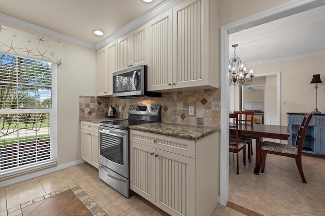 kitchen featuring light tile patterned floors, crown molding, stone counters, stainless steel appliances, and white cabinets