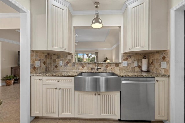 kitchen featuring tasteful backsplash, stainless steel dishwasher, and light stone counters