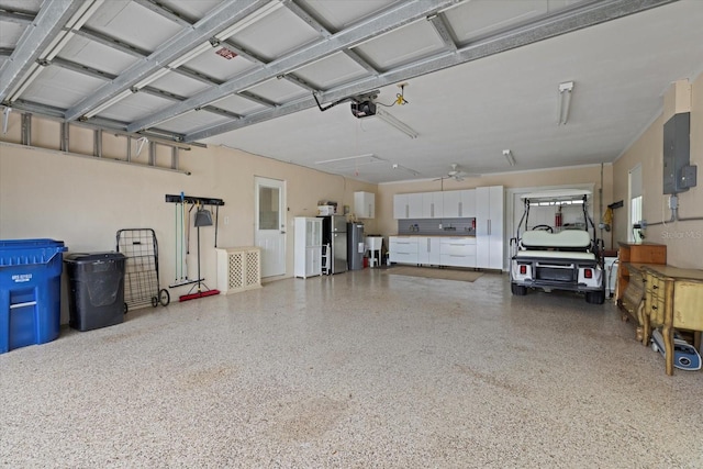 garage featuring a garage door opener and electric panel