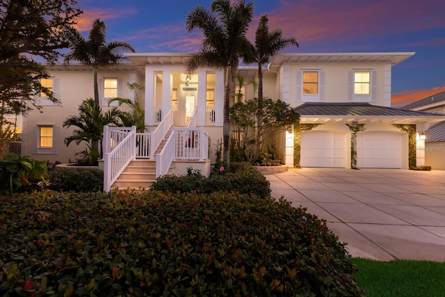 view of front of property with a garage