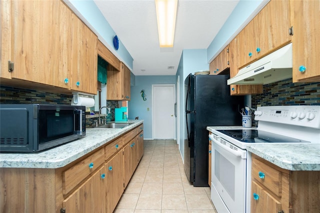 kitchen featuring electric stove, sink, tasteful backsplash, and light tile patterned floors