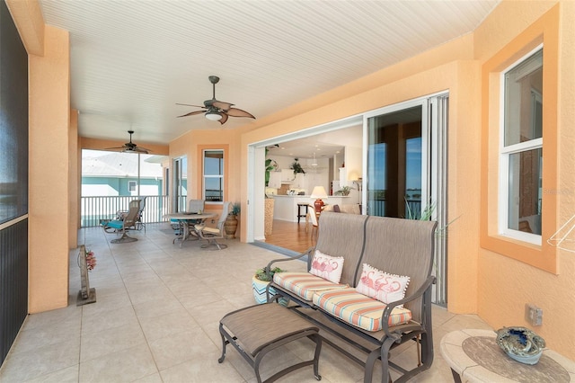 view of patio / terrace featuring ceiling fan