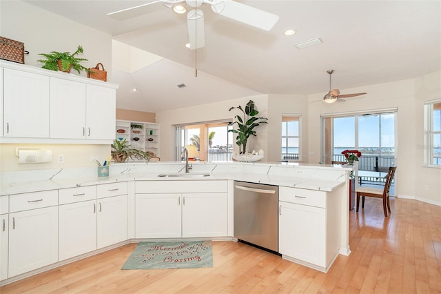 kitchen with sink, white cabinetry, dishwasher, kitchen peninsula, and ceiling fan