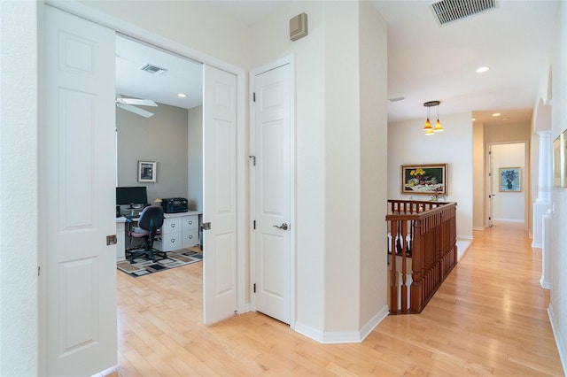 hall featuring light hardwood / wood-style floors