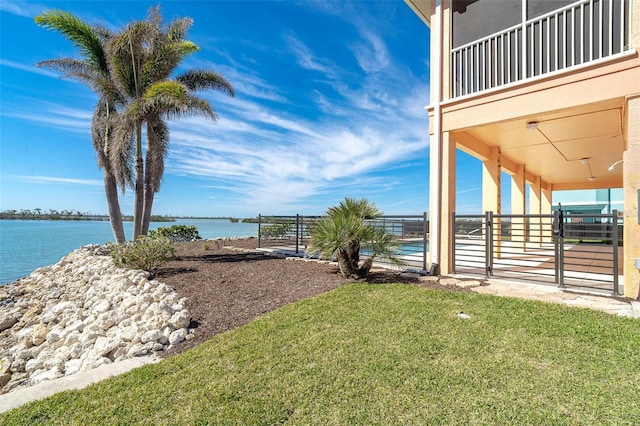 view of yard with a water view