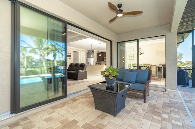 view of patio / terrace with an outdoor hangout area and ceiling fan