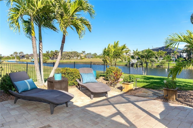 view of patio featuring a water view