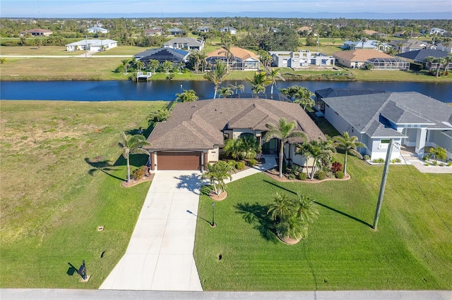 drone / aerial view featuring a water view