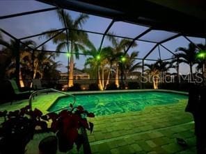 214 W Pine Valley Ln, Rotonda West, FL 33947 - outdoor pool with a lanai