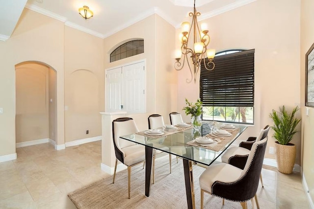 214 W Pine Valley Ln, Rotonda West, FL 33947 - dining room featuring arched walkways, a chandelier, crown molding, and baseboards
