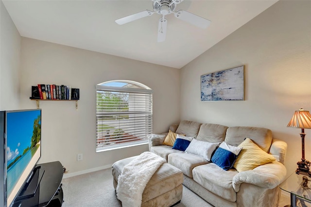 carpeted living room featuring vaulted ceiling and ceiling fan