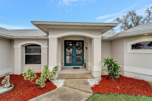 doorway to property featuring french doors