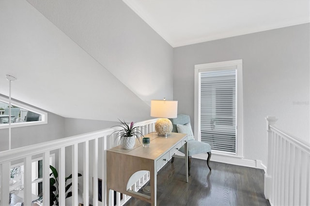 office area featuring vaulted ceiling and dark hardwood / wood-style flooring