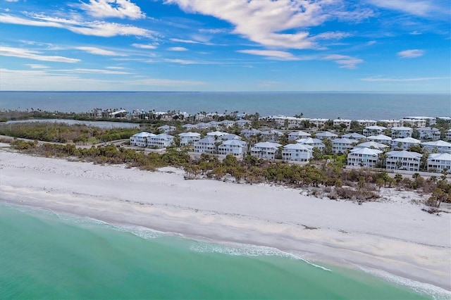 aerial view featuring a beach view and a water view