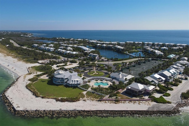 aerial view featuring a water view and a view of the beach