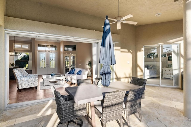 view of patio / terrace with french doors and ceiling fan