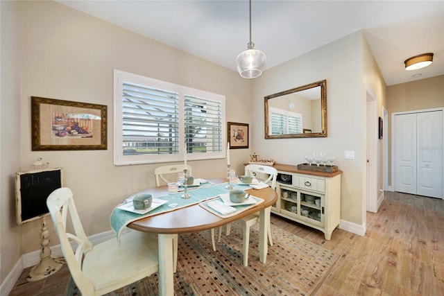 dining area with light wood-type flooring