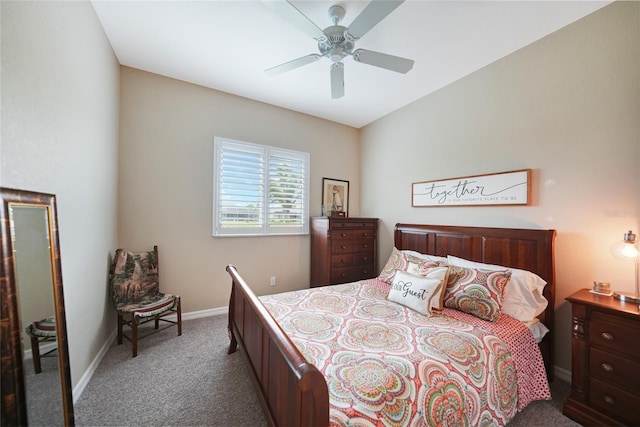 carpeted bedroom with vaulted ceiling and ceiling fan