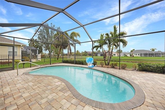 view of pool featuring a lanai and a patio area