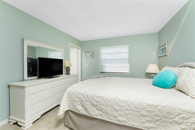 bedroom with a textured ceiling