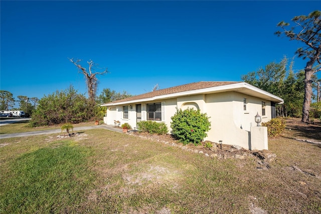 view of front of house with a front yard