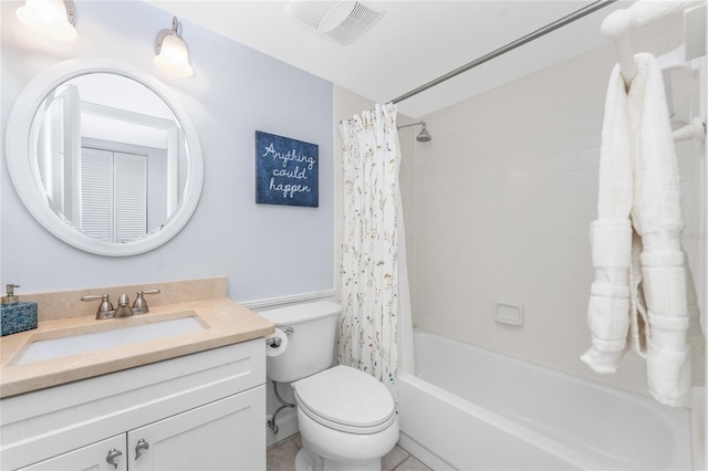 bathroom with toilet, shower / bath combo with shower curtain, vanity, and visible vents