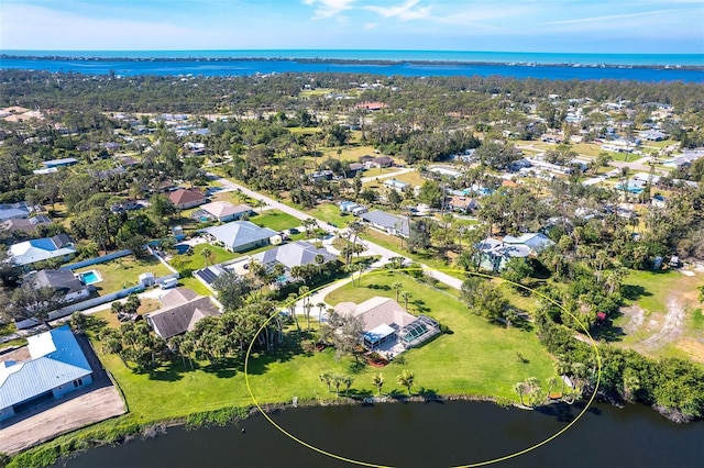 bird's eye view with a water view and a residential view