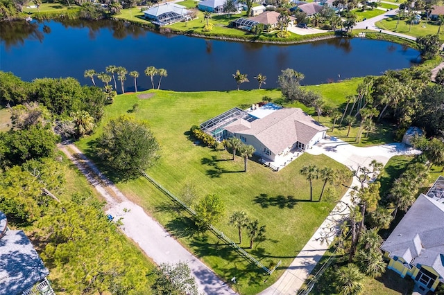 birds eye view of property featuring a water view