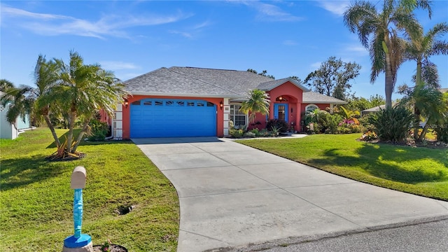 ranch-style house with a garage and a front yard