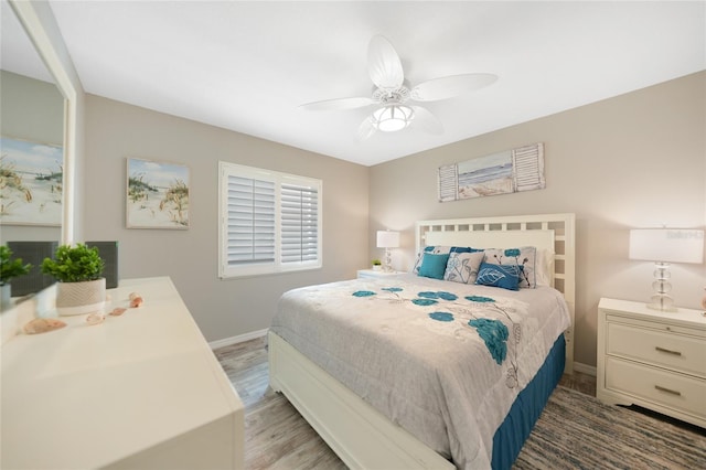 bedroom featuring ceiling fan and light hardwood / wood-style flooring