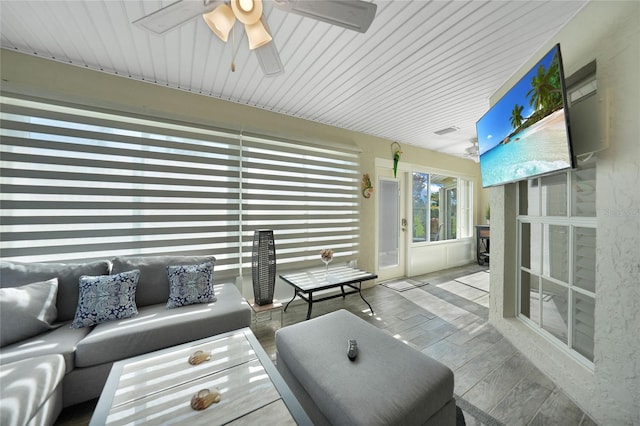 interior space featuring hardwood / wood-style flooring and ceiling fan