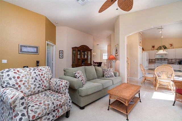 living room featuring ceiling fan